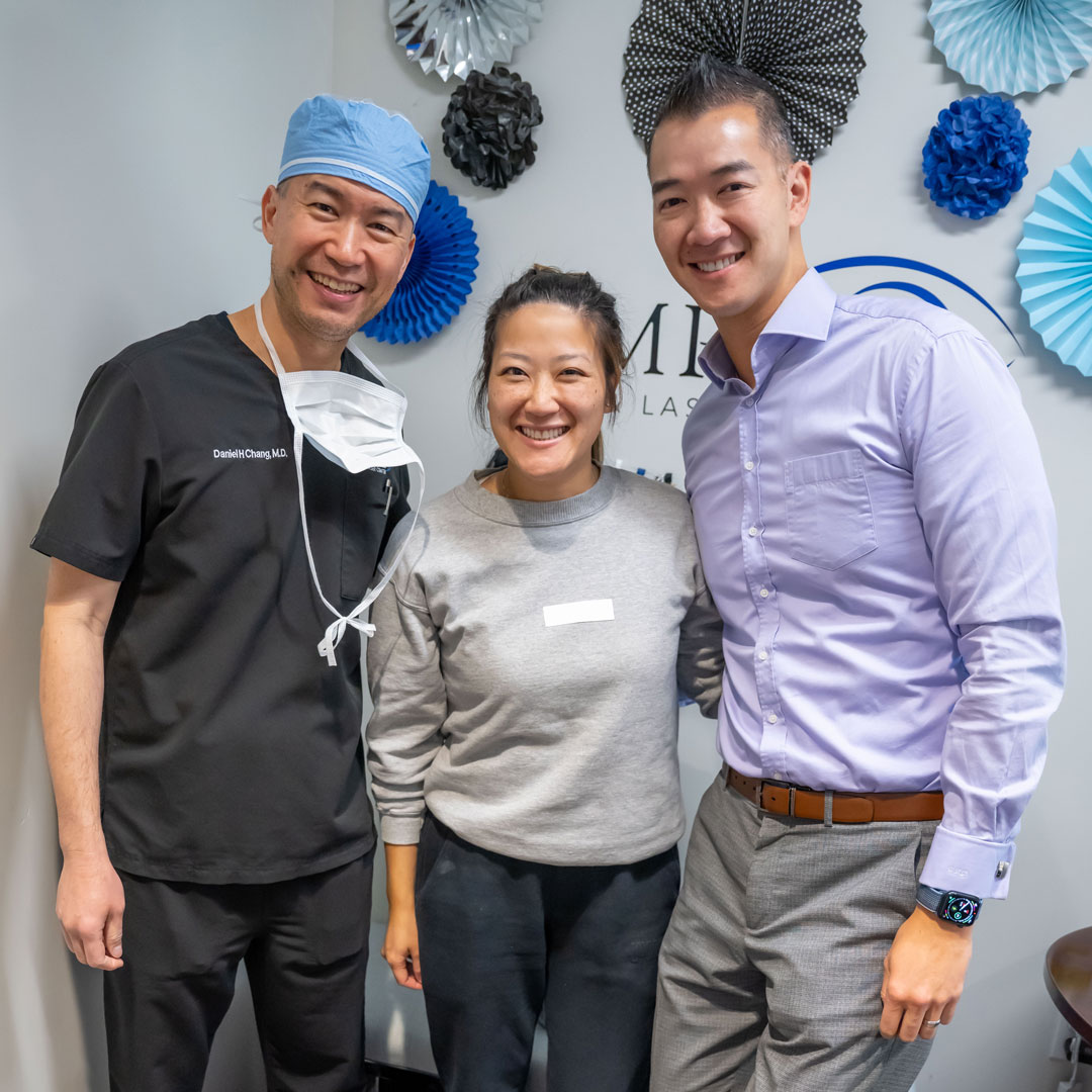 Dr. Chang and Dr. Dang posing with a patient after PRK surgery.